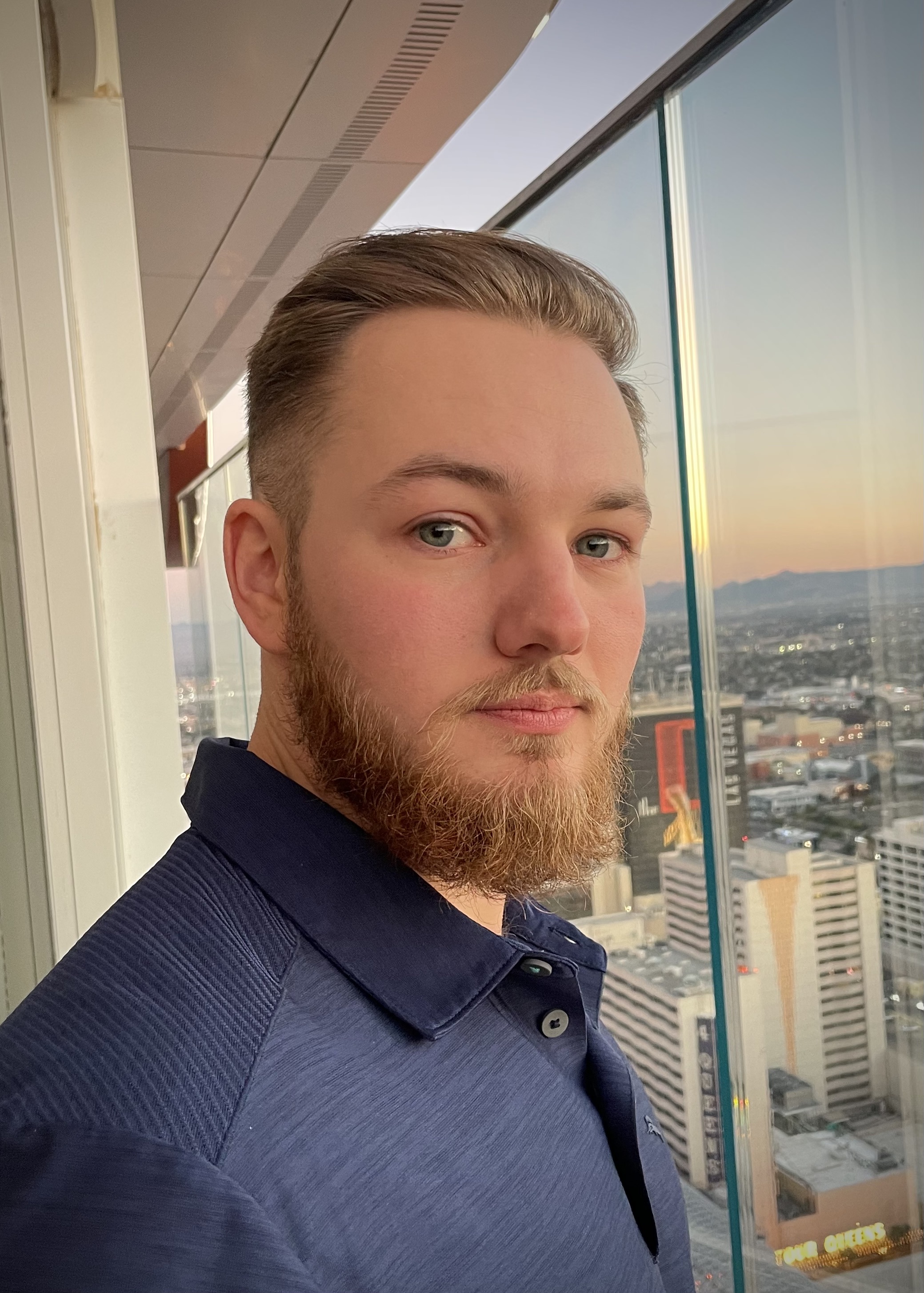 A picture of me sitting at a rooftop bar